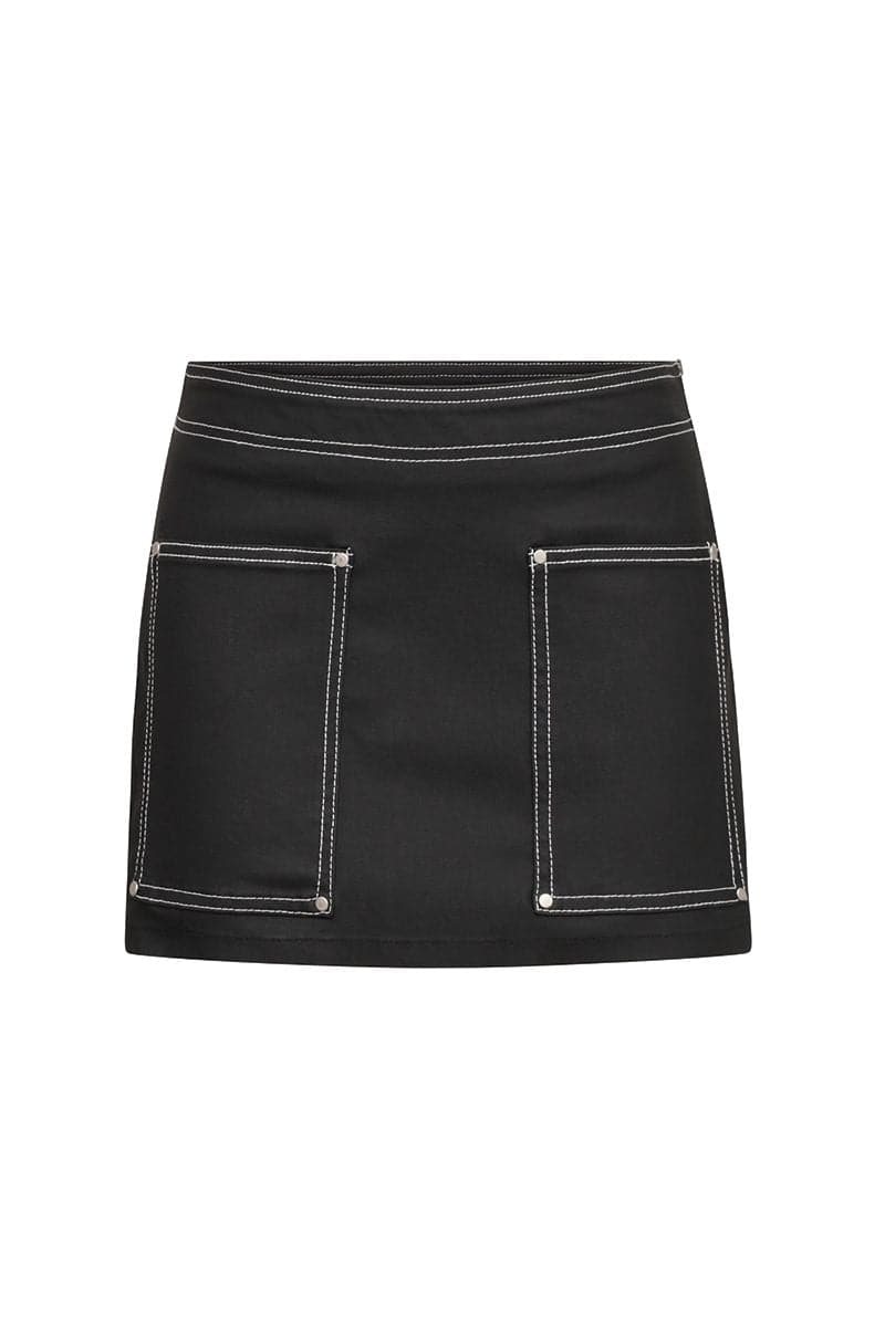 Denielle William St TT Studios denim mini skirt shown on a model, featuring classic blue denim and a fitted style.