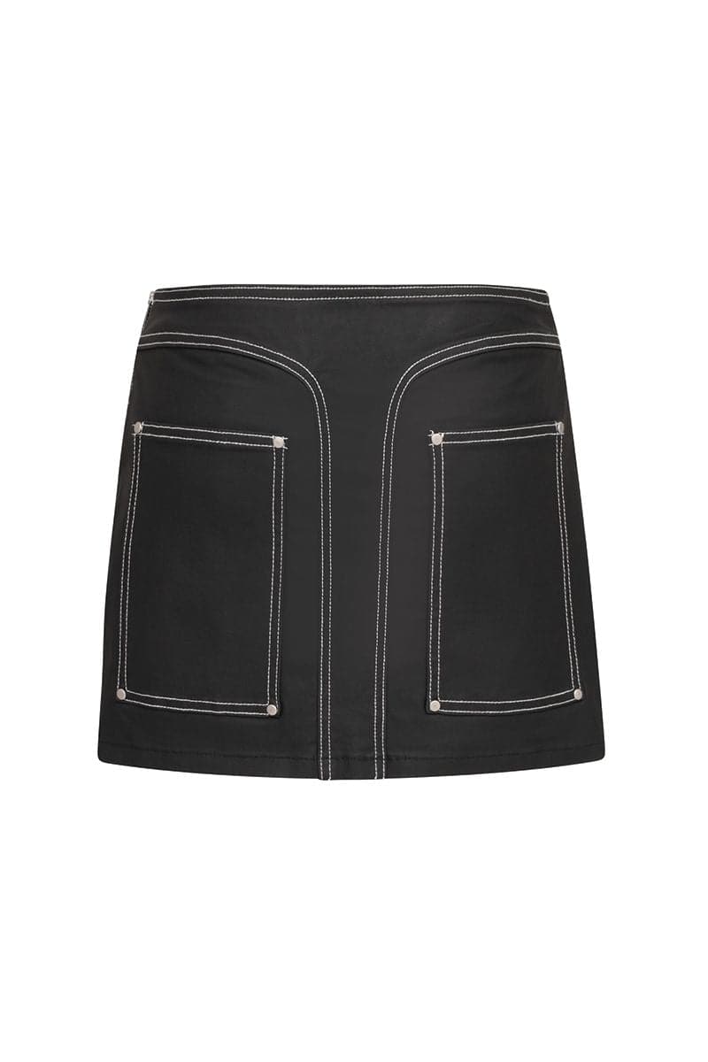 Denielle William St denim mini skirt by TT Studios, shown on a model, featuring classic blue denim and a fitted style.
