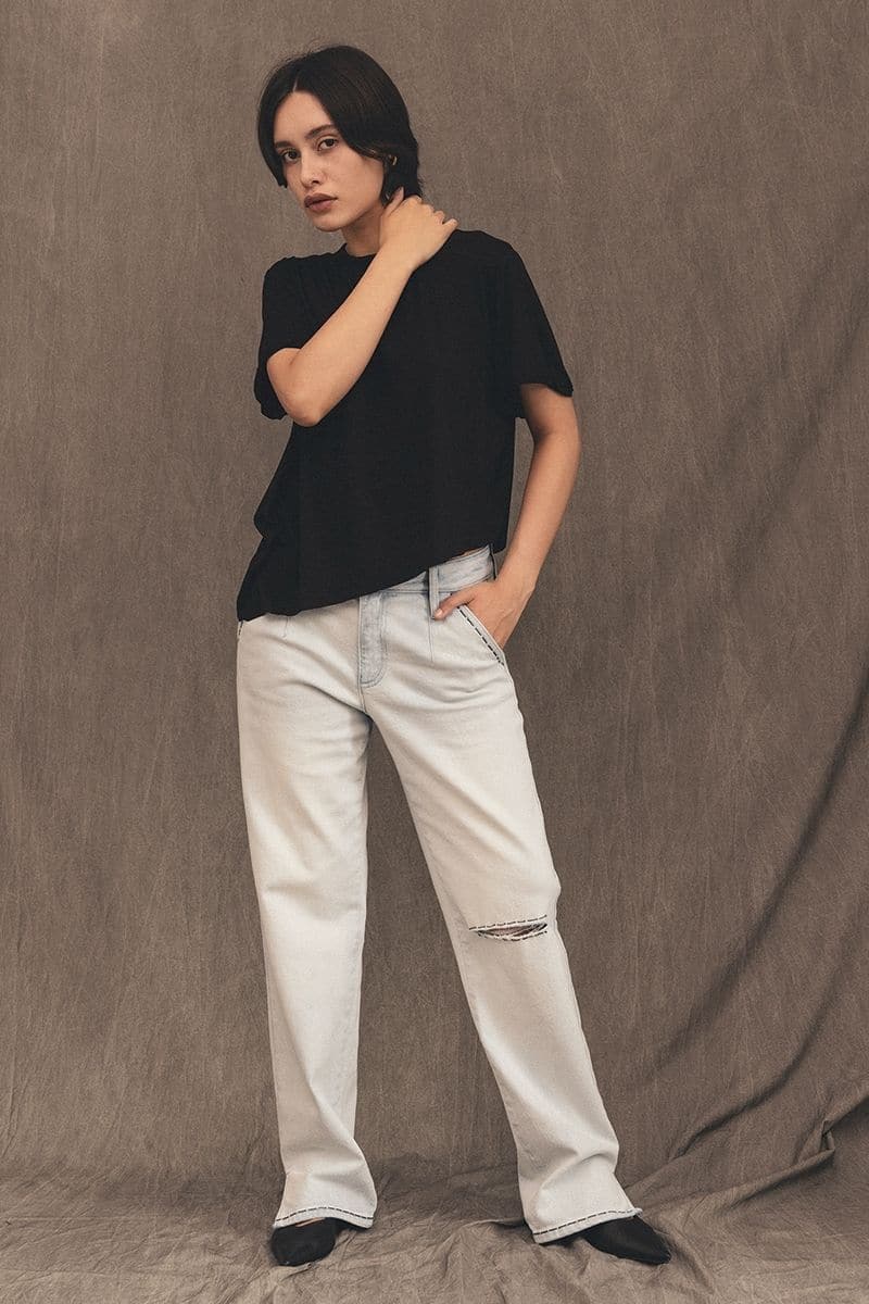 Taylor Mercer straight leg jeans by TT Studios, showing classic denim with a relaxed fit and clean stitching.