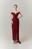 Red tweed off-shoulder maxi gown by Happy Clothing, featuring petal design and elegant flowing silhouette.