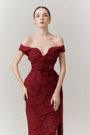 Red off-shoulder tweed petal maxi gown by Happy Clothing, featuring a stylish neckline and elegant flowing fabric.