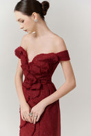 Red off-shoulder tweed maxi gown by Happy Clothing featuring a fashionable petal design and elegant flowy silhouette.