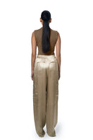 Ura Marie trousers in champagne color, stylish women's pants with a tailored fit, shown on a model.