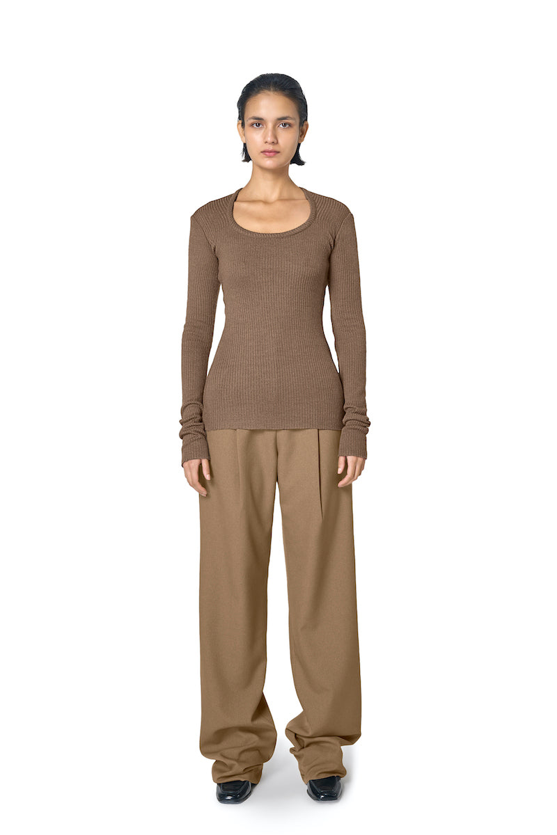 Brown ODA top by URA featuring a stylish design, displayed on a neutral background.