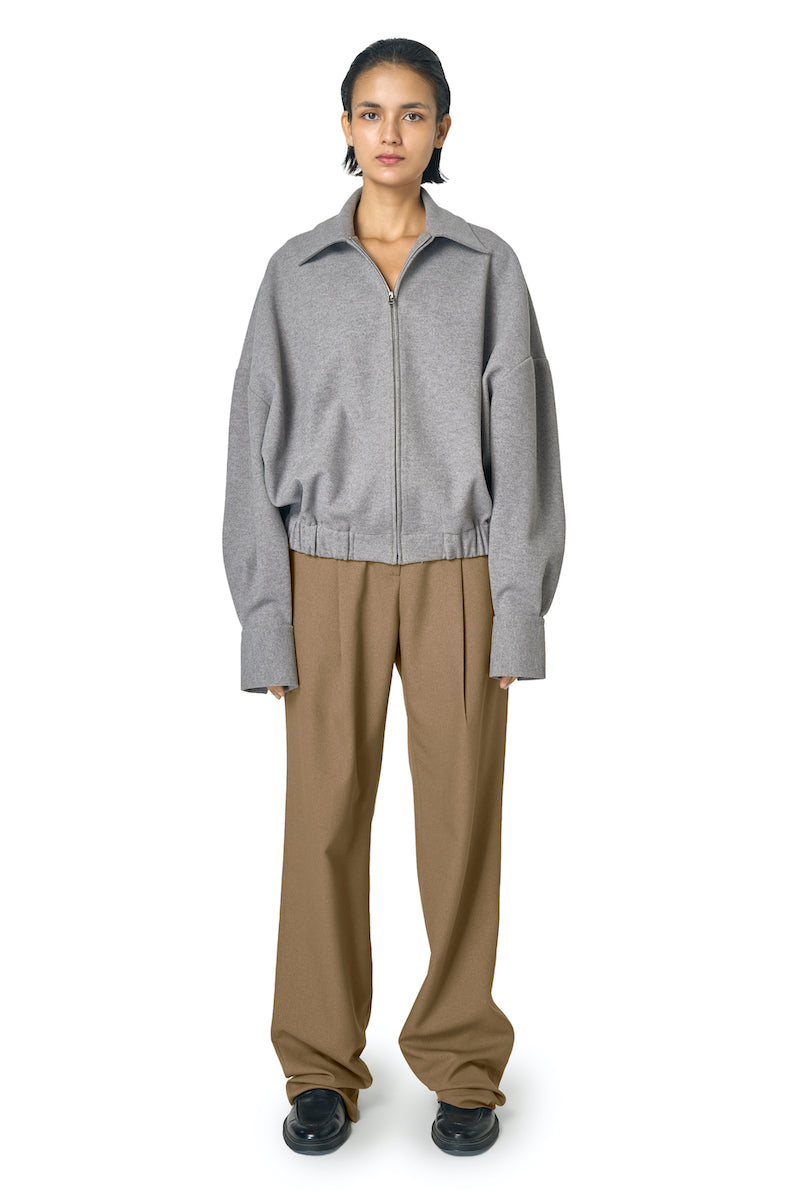 Gray Steph jacket from URA, stylish and comfortable women's jacket with a sleek design, shown on a model.