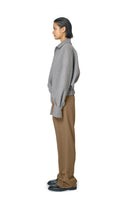 Gray STEPH jacket by URA, featuring a stylish design with a zip-up front and comfortable fit, shown on a model.