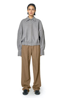 Gray STEPH jacket by URA, stylish outerwear with a modern fit, shown on a model with a sleek design and casual look.