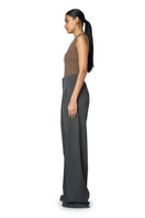 Gray URA Ruth trousers, stylish pants with a tailored fit, shown on a model with a clean, minimalist background.