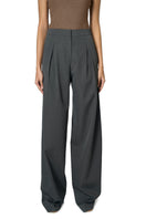 Gray URA Ruth trousers, stylish pants with a tailored fit, displayed on a model showcasing their sleek design and fabric details.
