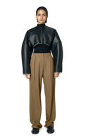 Black Adele bomber jacket by URA, shown on a hanger with a sleek, modern design and ribbed cuffs and collar.