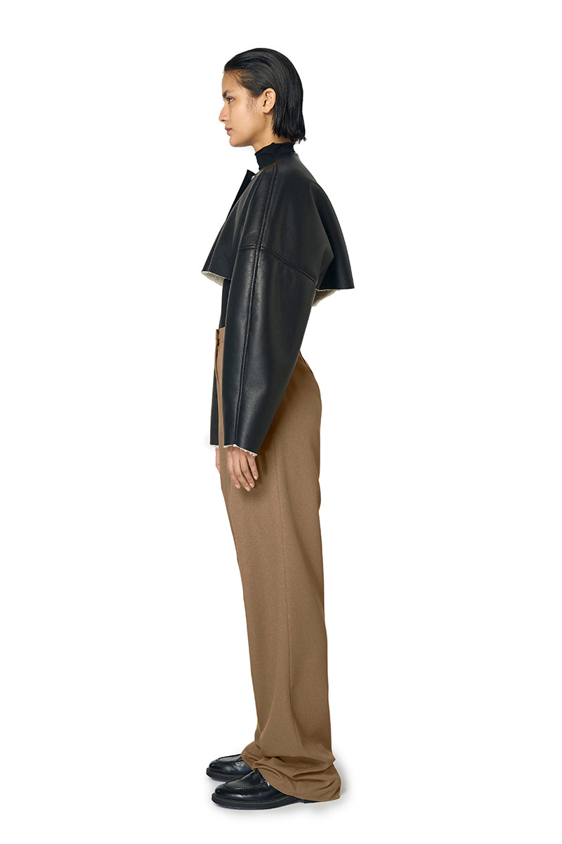 Black Adele bomber jacket by URA featuring a stylish fit and zip front, displayed on a mannequin.