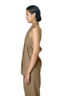 BeKY N camel-colored top by URA, stylish women's sleeveless top with a relaxed fit, shown on a model.