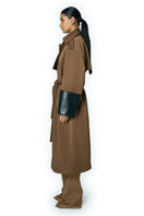 URAA coat in camel color, stylish and warm, featuring a classic design perfect for cooler weather.