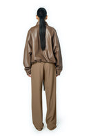 URA RIA jacket in toffee, stylish women's jacket with a soft fabric finish, shown on a hanger.