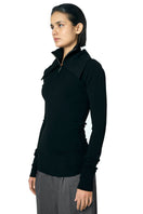 Black JOE B sweater by URA, featuring a cozy knit design and classic fit, shown on a model.