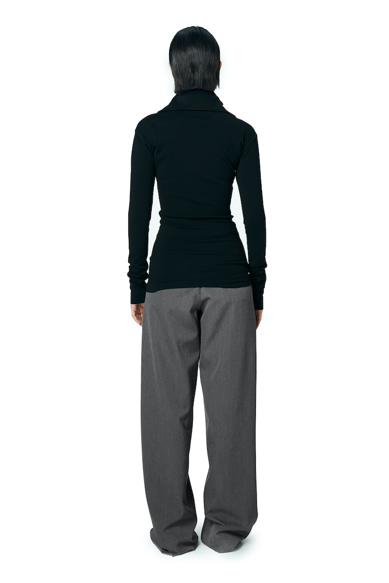 Black JOE B sweater by URA, featuring a cozy knit design and classic fit, displayed on a mannequin.
