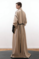 Vaska beige ribbon coat with leather buttons, stylish and warm, featuring a tailored fit and neutral tone.