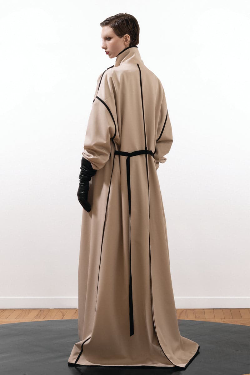 Vaska beige ribbon coat with leather buttons, stylish and warm, featuring a tailored fit and neutral tone.