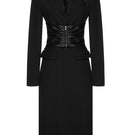 Vaska black belted vegan leather coat in size XS, featuring a classic design with a belt and sleek black finish.
