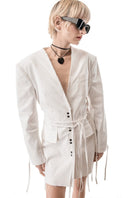 Vaska white denim jean jacket dress displayed on a hanger, featuring a classic jacket style with long sleeves and button front.