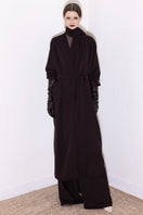 Dark brown Vaska oversized coat with a scarf collar, stylish and warm, shown on a model with a relaxed fit.