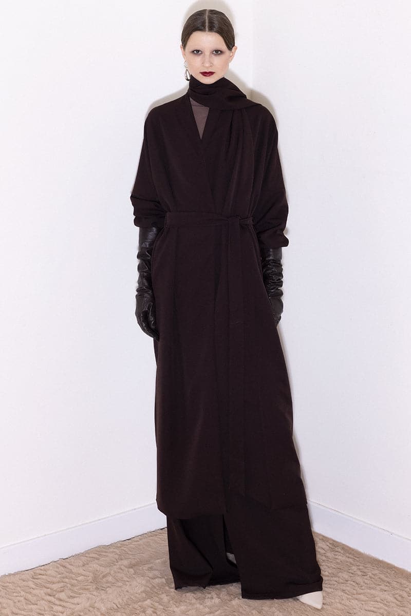 Dark brown Vaska oversized coat with a scarf collar, stylish and warm, shown on a model with a relaxed fit.
