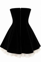 Black velvet mini dress by Urban Muse, featuring a stylish and fitted design perfect for trendy occasions.