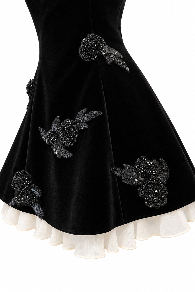 Black velvet mini dress from URBAN MUSE, featuring a sleek fit and stylish design, perfect for fashionable occasions.