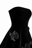 Black velvet mini dress by Urban Muse, featuring a stylish mini length and soft velour fabric for a chic look.
