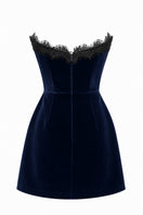 Urban Muse navy velvet mini dress, stylish and fitted, shown in a close-up image highlighting the soft fabric and elegant design.