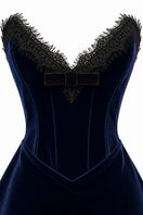 Urban Muse navy velvet mini dress, stylish and fitted, shown on a hanger with a close-up of the soft fabric texture.