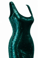 Elegant green Veridian gown by Urban Muse featuring flowing fabric and stylish design, perfect for formal occasions.