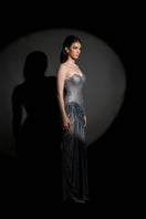 HACCHIC COUTURE Celestia Crystal Draped Gown featuring shimmering crystals and elegant draping fabric.