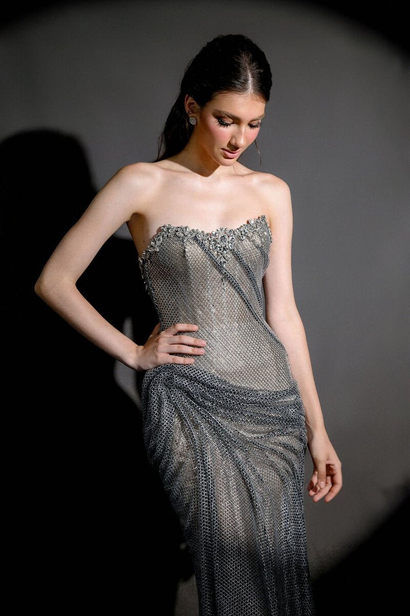 HACCHIC COUTURE Celestia Crystal Draped Gown with shimmering fabric and elegant draping, perfect for formal occasions.