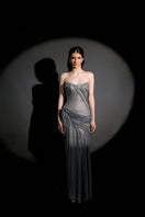 Elegant HACCHIC COUTURE Celestia Crystal Draped Gown with shimmering embellishments and flowing fabric, perfect for formal occasions.