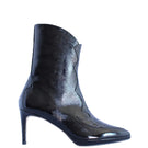 Black WANDA 70 boots by Terry de Havilland, featuring sleek leather design and pointed toes.