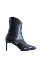 Black WANDA 70 boots by Terry de Havilland, featuring sleek leather design and pointed toes.