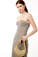 Emm Kuo Waverly shoulder bag in champagne color, featuring a sleek design and elegant leather finish.