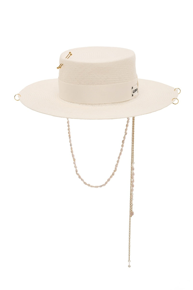 White canotier hat by LE SH KA, featuring a wide brim and classic design, showcased on a neutral background.