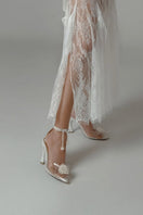 Christin Wu Whitney heels in Jasmine color, stylish women's high heels with elegant design and pointed toe, image showing side view.