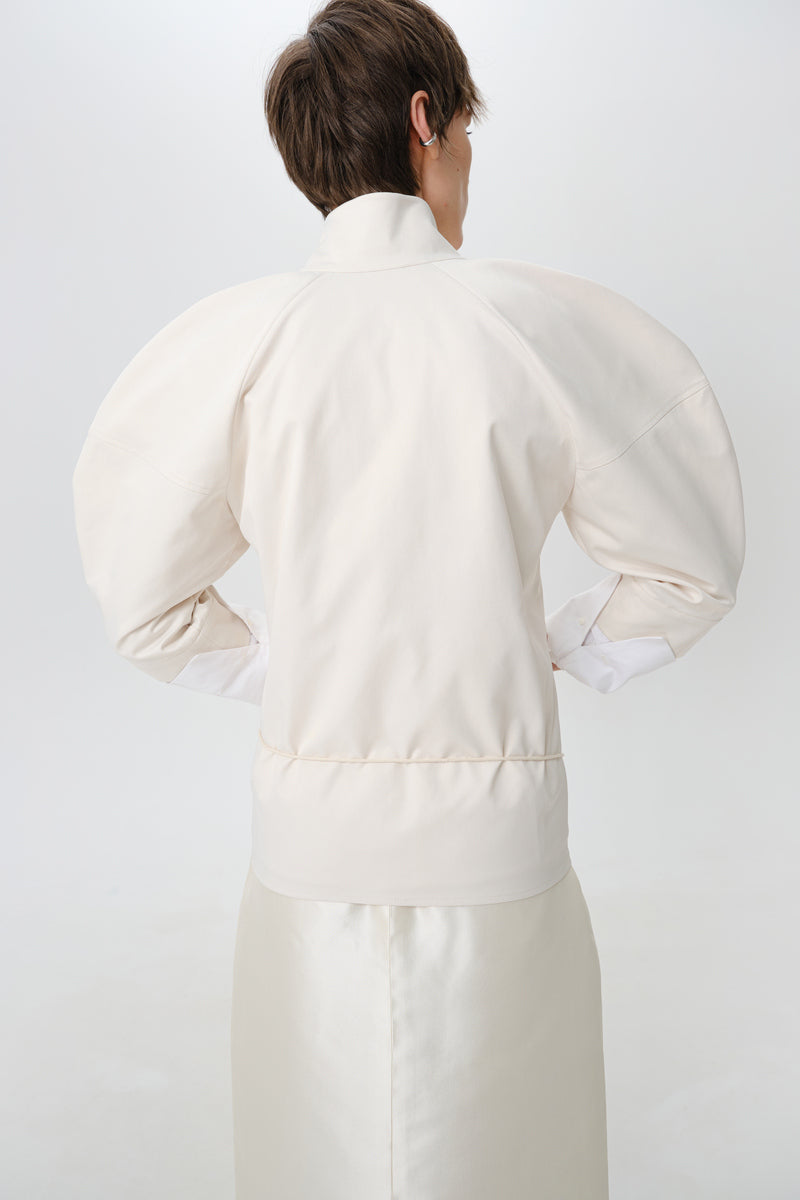 Gray-beige DELEGAN structure shirt shown from the back, featuring a tailored fit and subtle fabric texture.