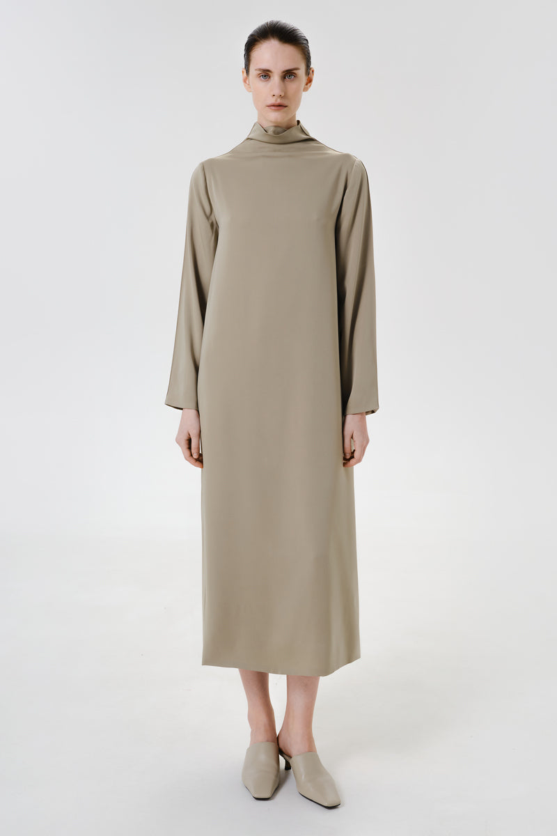 Elegant olive sheen midi dress by DELEGAN, shown worn front view with flowing fabric and stylish design.