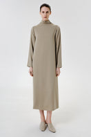 Elegant olive sheen midi dress by DELEGAN, shown worn front view with flowing fabric and stylish design.
