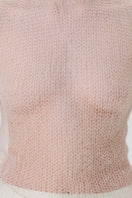 DELEGAN soft skin long sheer knit top worn front, lightweight, semi-transparent fabric, long sleeves, fitted style.