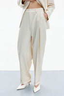 Front view of DELEGAN LINE WHITE PANTS, stylish white pants with a modern fit and clean design.