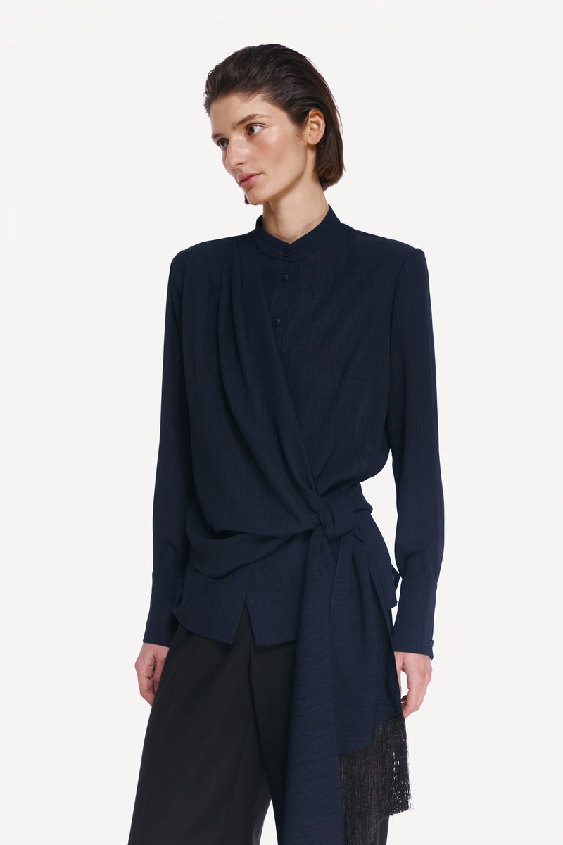 DELEGAN belted blue and black shirt worn front, featuring a stylish belt and casual fit, showcased on a model.