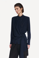 Front view of a DELEGAN belted blue and black shirt with a tailored fit and stylish design.