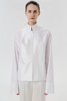 DELEGAN Still Line Shirt displayed from the front, showcasing a stylish, casual shirt with a modern design and clean lines.