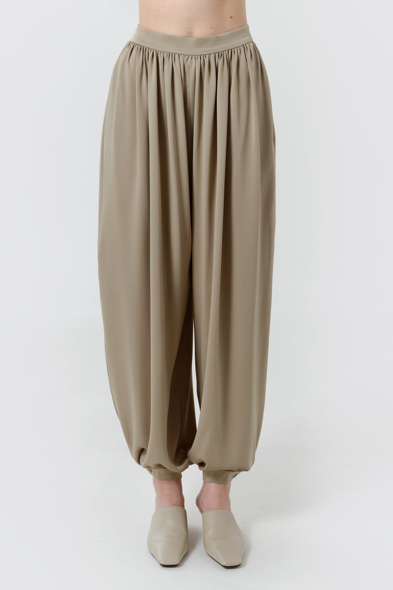 DELEGAN Olive Flow Pants, front view showing relaxed fit and lightweight fabric, casual stylish pants for everyday wear