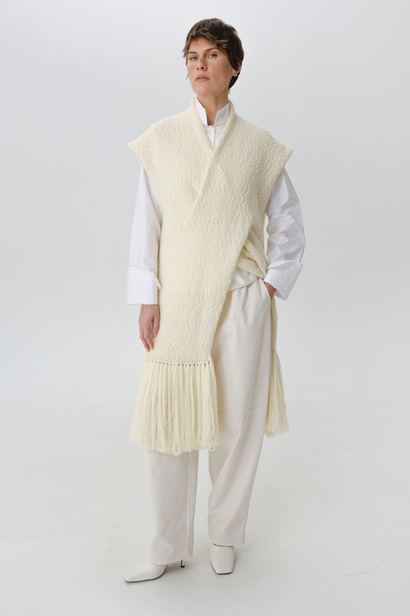Textured knit vest cardigan by DELEGAN worn front view, showcasing its cozy, detailed knit pattern and relaxed fit.